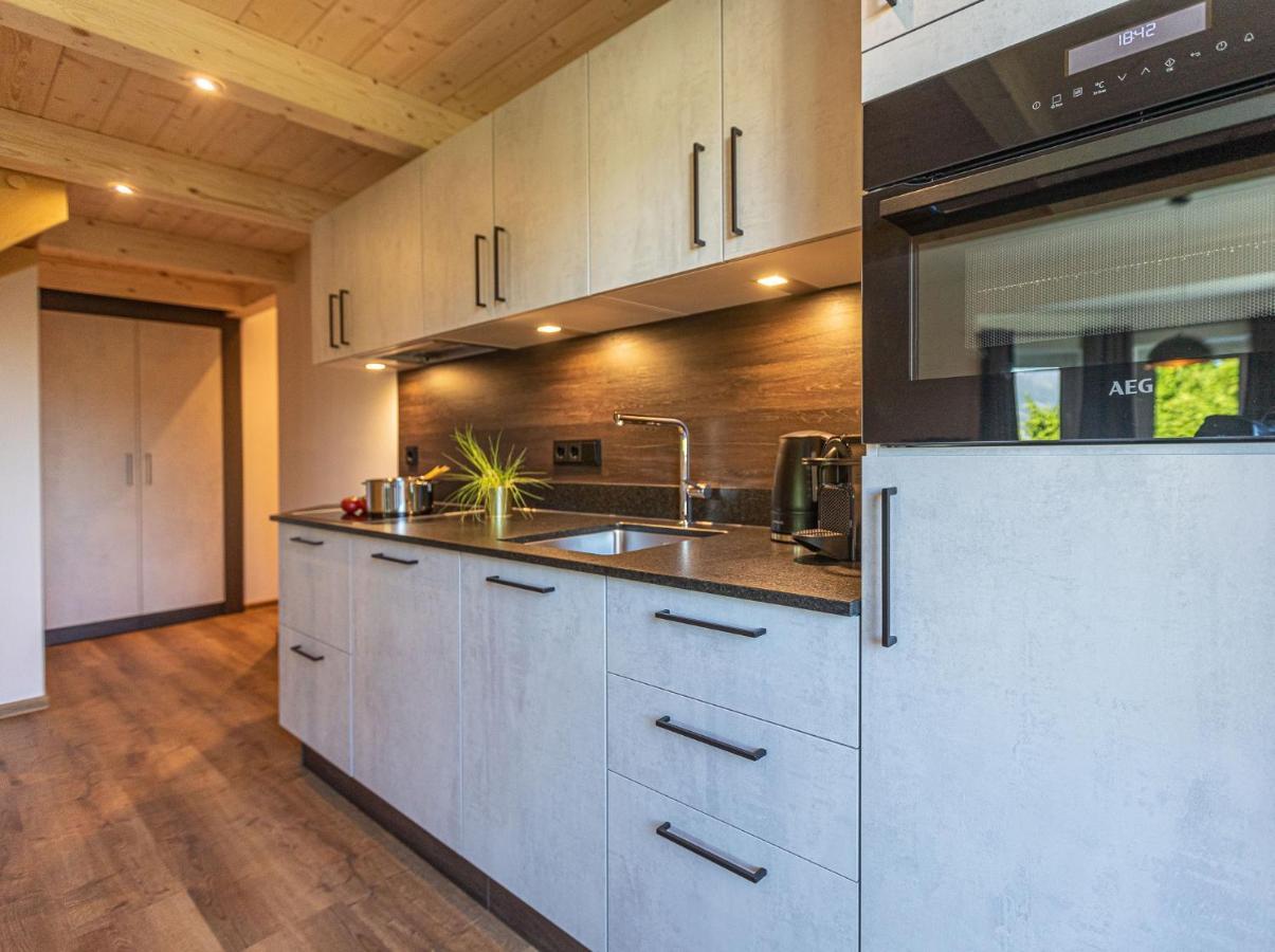 Tevini Boutique Suites By We Rent Zell am See Esterno foto